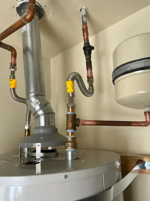 Water heater installation and plumbing repair in Timberleaf
